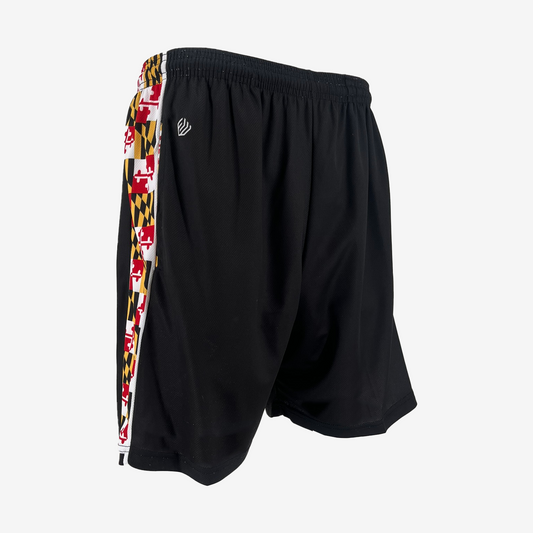 Black shorts with colorful side panels on a white background