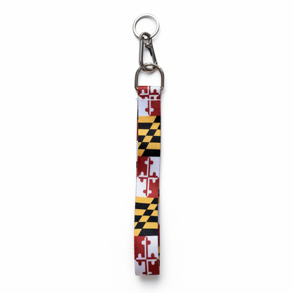 Keychain with Maryland flag design on a white background