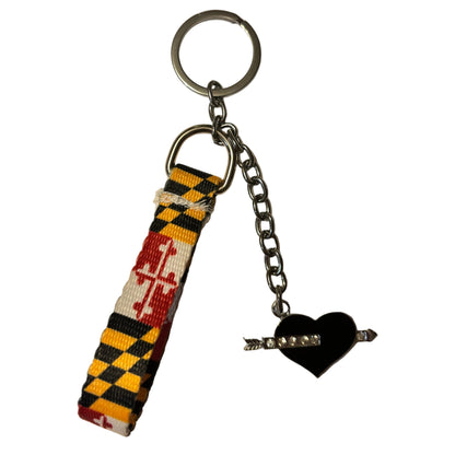 Keychain with Maryland flag design and heart-shaped charm on a white background
