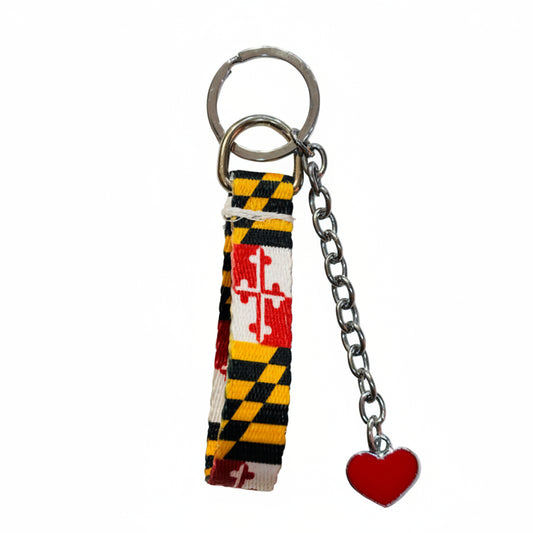 Keychain with Maryland flag strap and heart charm on a white background