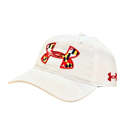 Beige cap with Under Armour logo on a blurred background